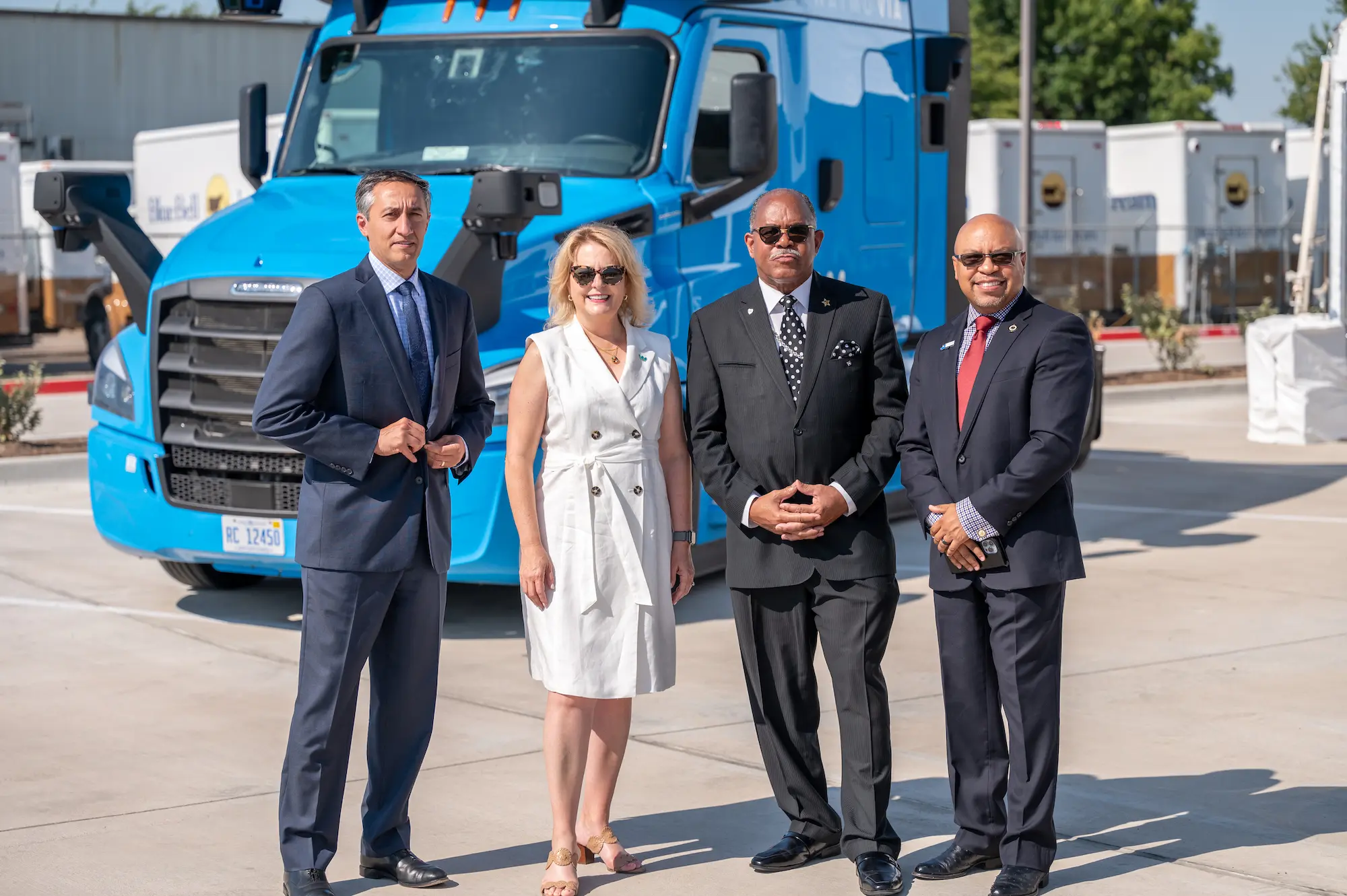 Waymo leadership at ceremony