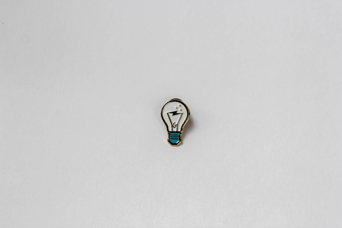 Buie & Co. enamel lightbulb pin