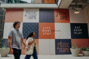 Couple walking at Music Lane